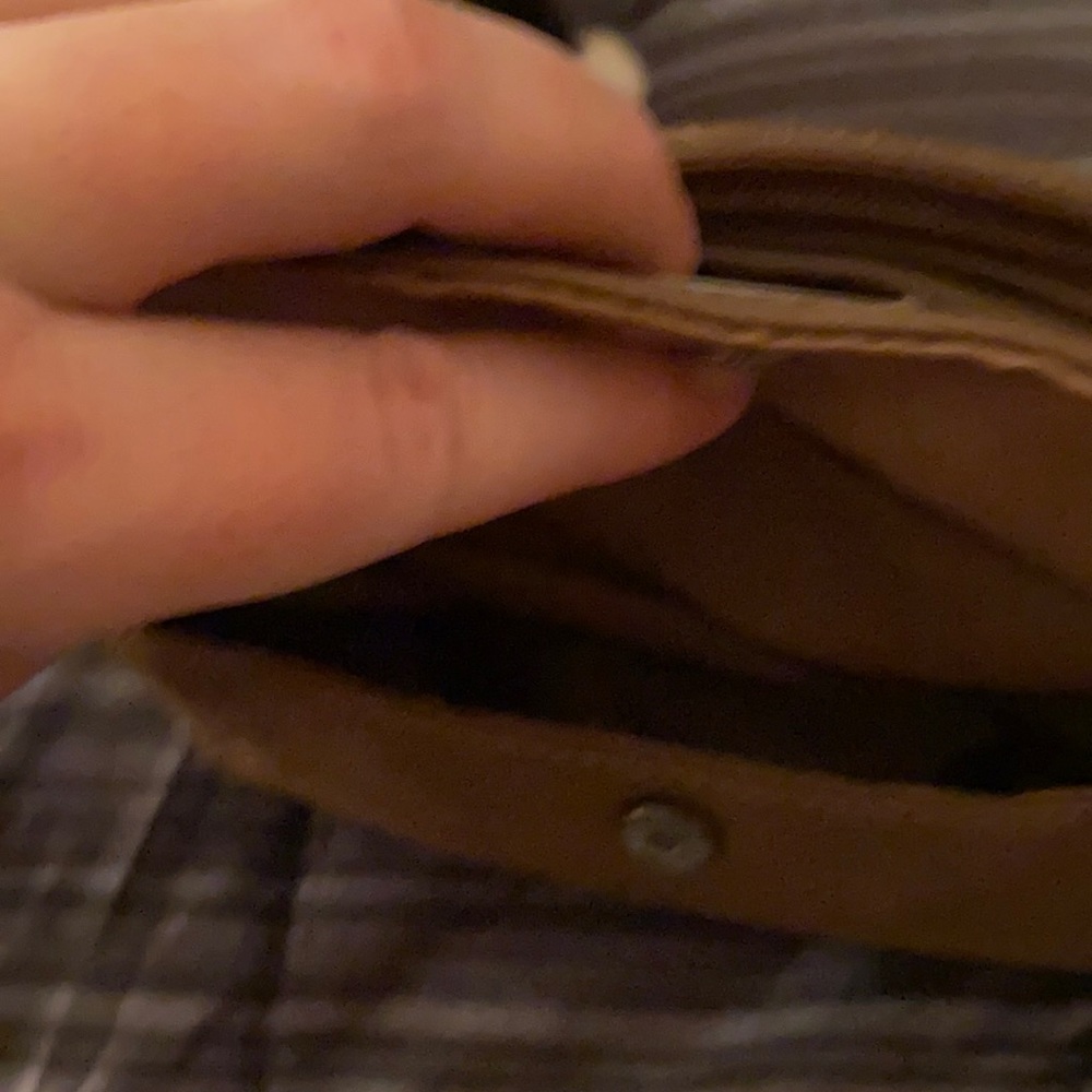 Brown/ tan purse with lots of pockets. Brand is St. John’s Bay.